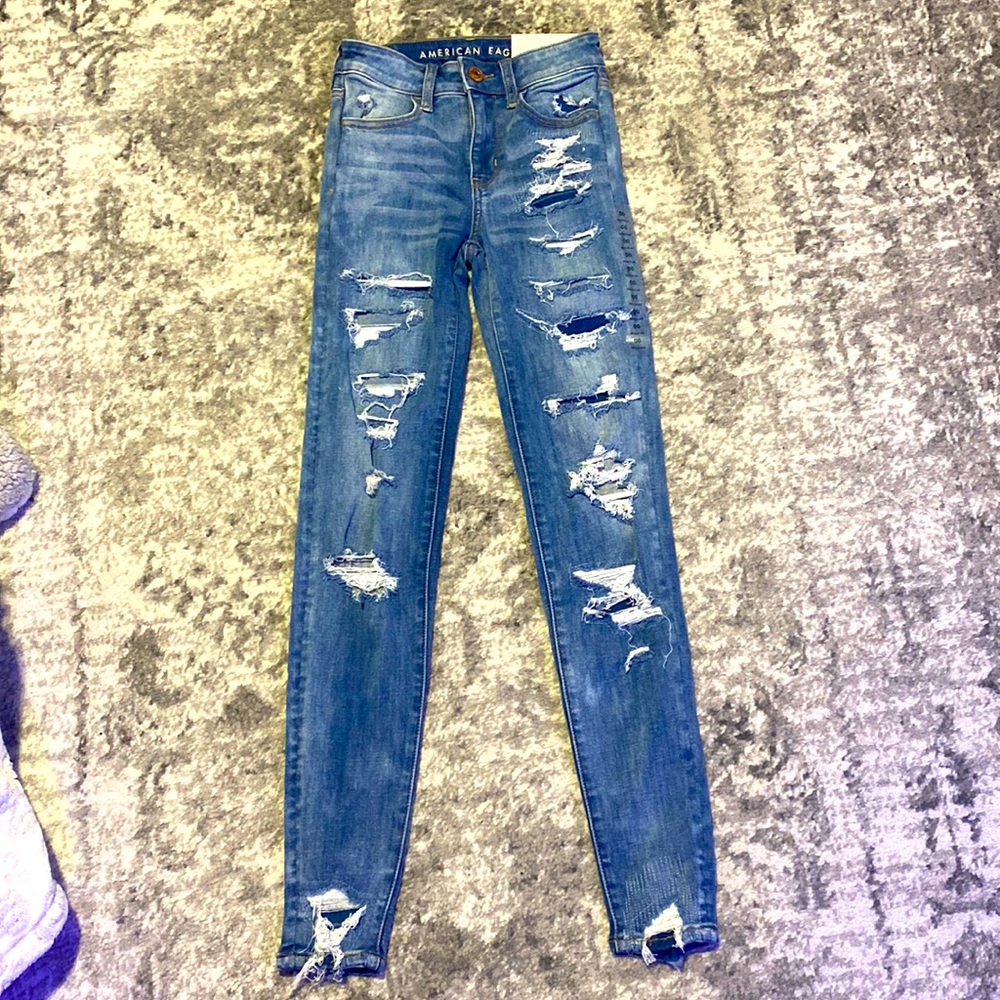 I am selling high rise blue ripped jeans.They are a 00 and ne(x)t level stretch.